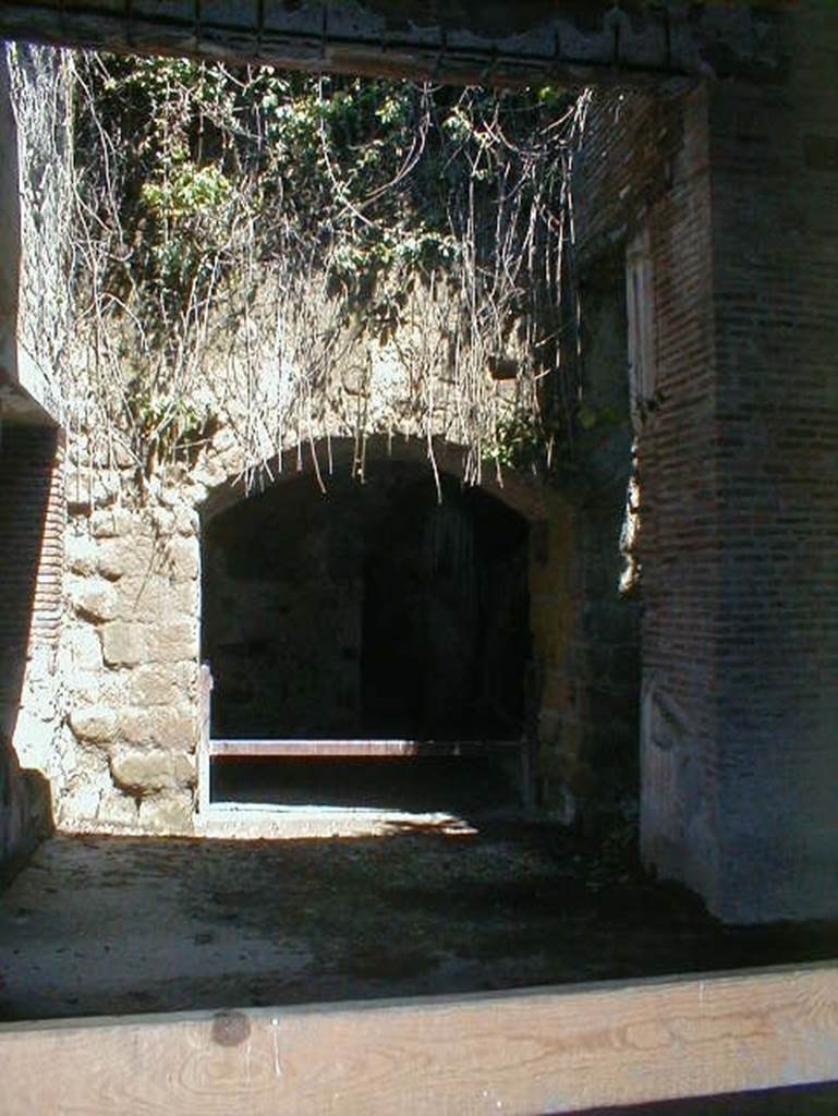 II.2, Herculaneum. May 2004.  Looking towards a re-opened Bourbon tunnel, with a second smaller peristyle, on right.

