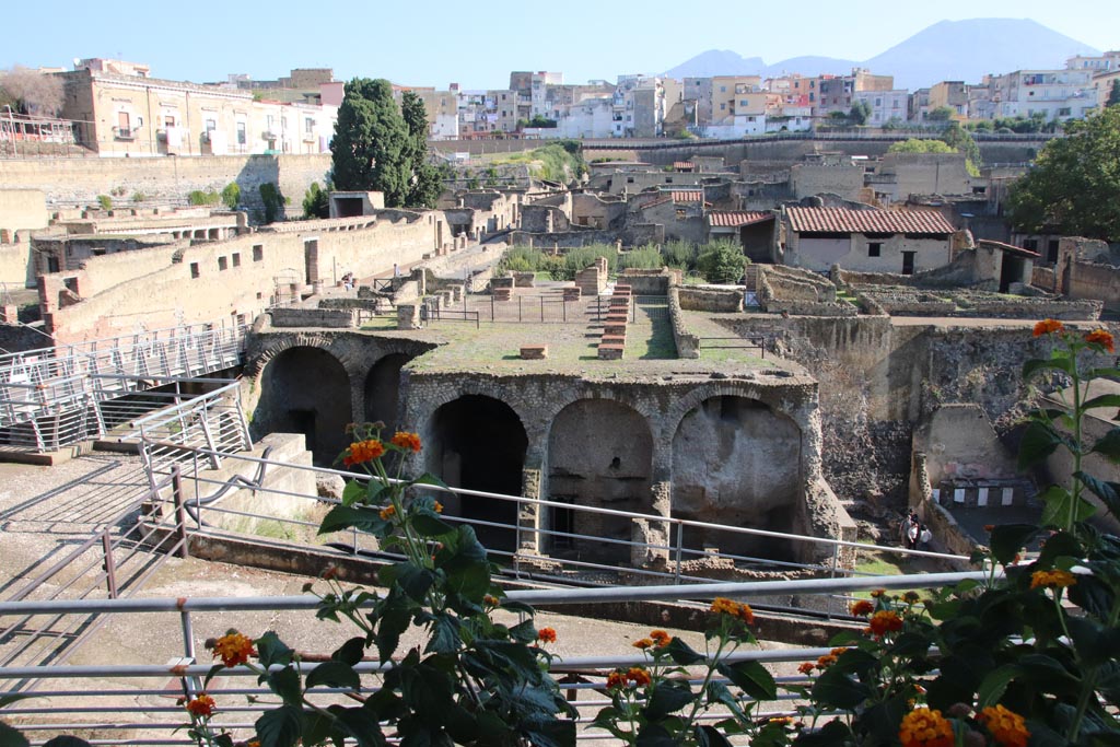 III.1/2/18/19, Herculaneum, October 2022. 
Looking north from access roadway towards upper and lower rooms. Photo courtesy of Klaus Heese.
