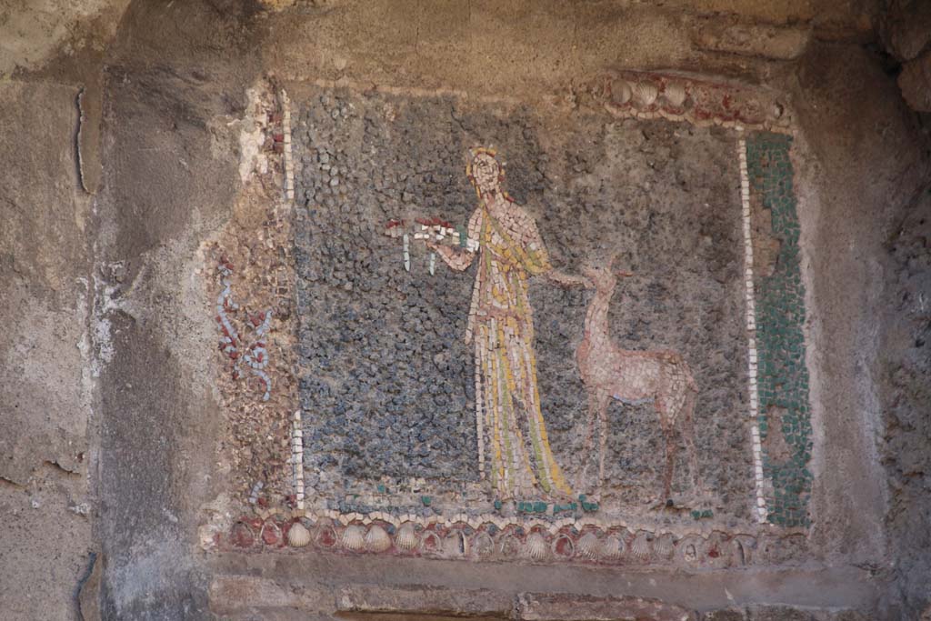 III.3 Herculaneum. April 2014. Frieze at south end, on right hand side. 
According to Guidobaldi and Esposito, this shows a supplicant with a fawn. Photo courtesy of Klaus Heese.
