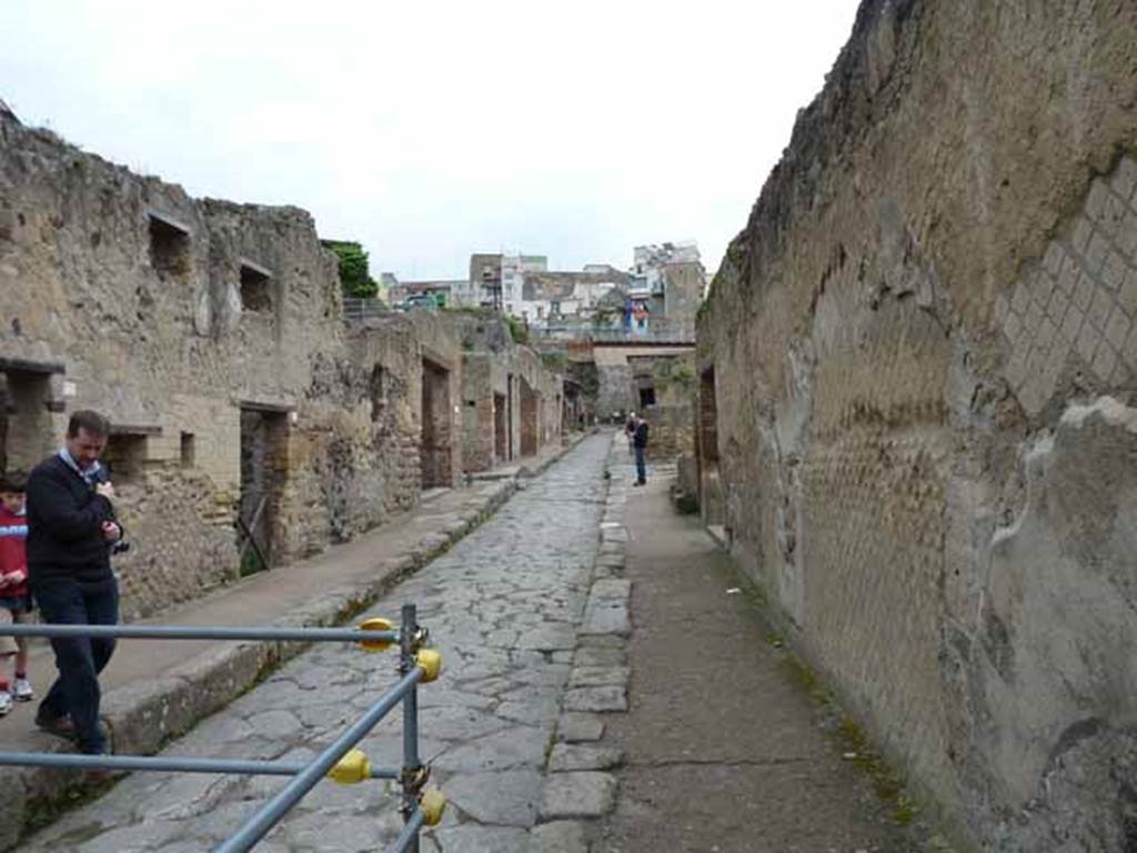 Ins II. on left, and Ins III. on right, Herculaneum. May 2010. Looking north along Cardo III Inferiore. 
