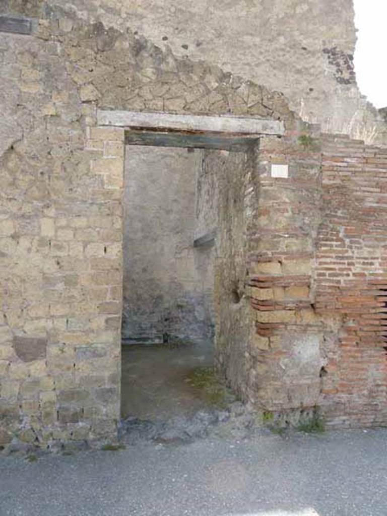 Ins.III.9, Herculaneum. May 2010. Entrance doorway on Decumanus Inferior, looking south.