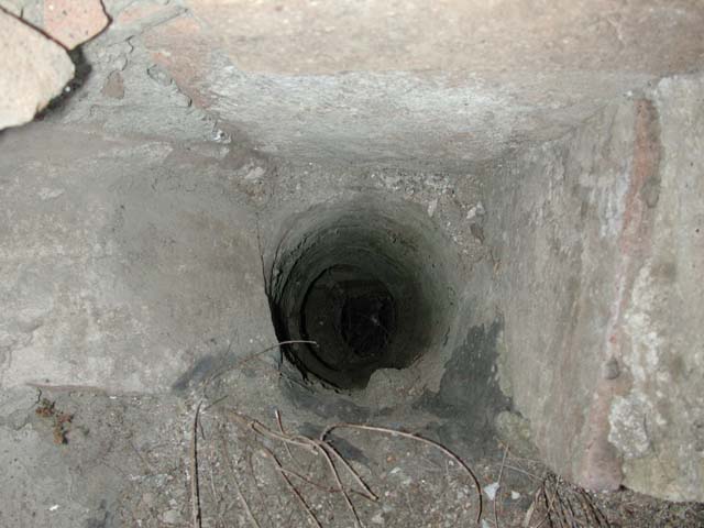 III.10, Herculaneum. September 2003. Detail of downpipe of latrine in upper floor room, connecting to latrine in III.9. Photo courtesy of Nicolas Monteix.

