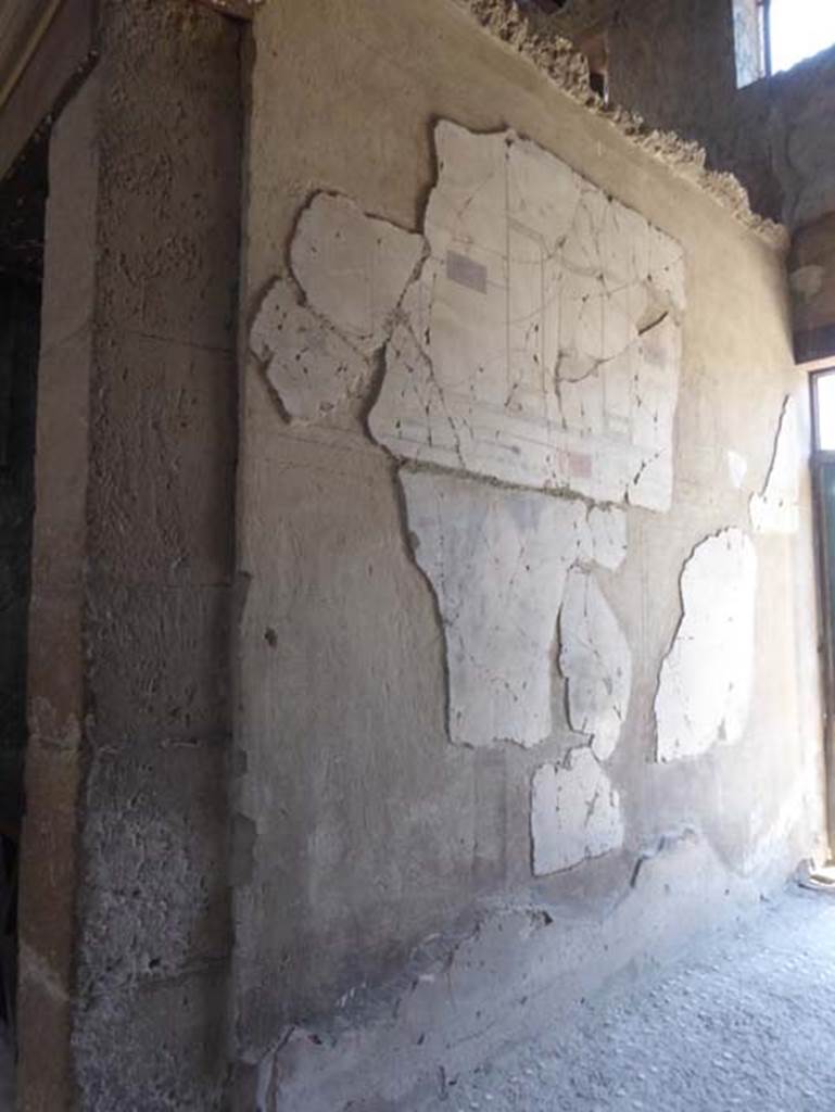 III,11, Herculaneum, June 2017, Room 1, painted decoration on north wall of entrance corridor, looking east.  Photo courtesy of Michael Binns.
