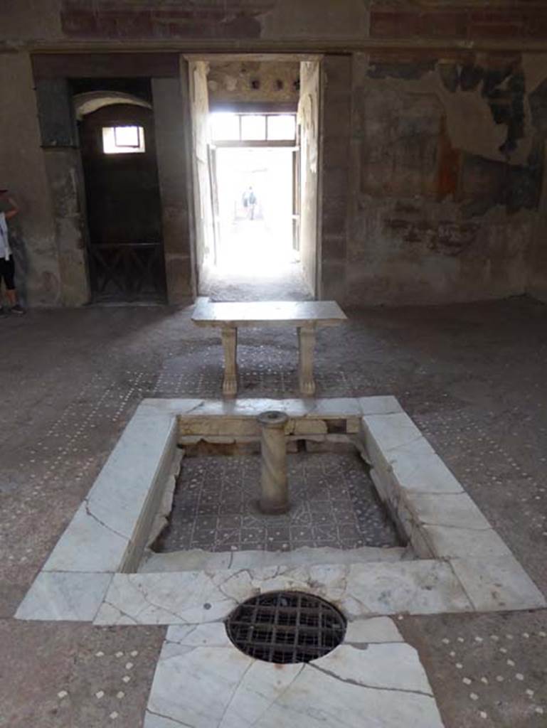 III.11 Herculaneum, October 2014. Looking east across atrium, towards doorway to room 2, on left, and entrance doorway, in centre. Photo courtesy of Michael Binns.
