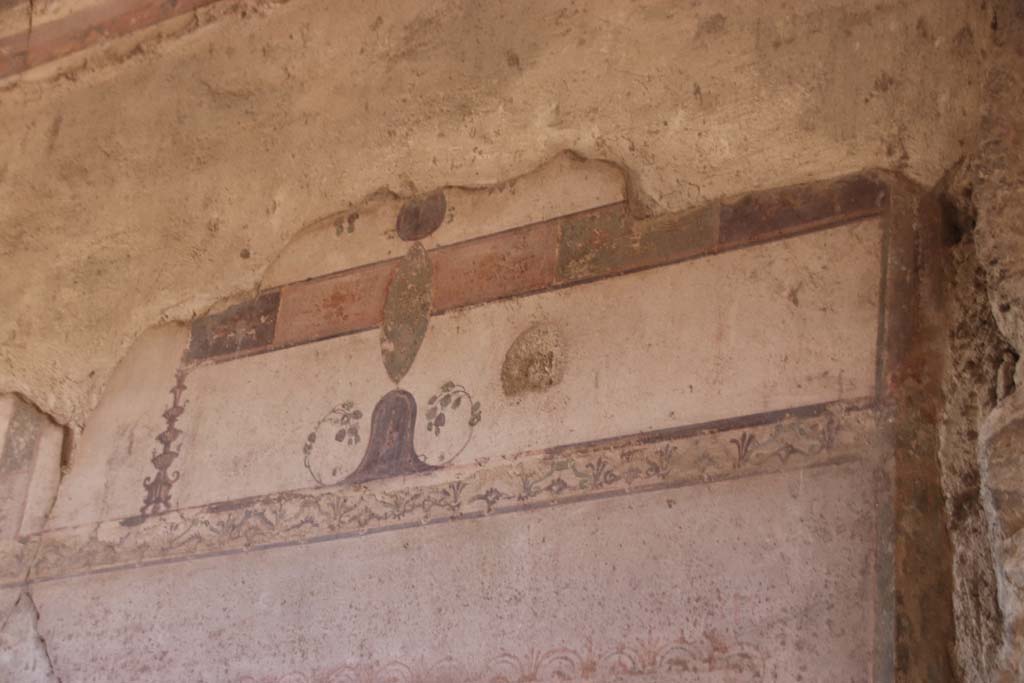 III.11 Herculaneum, October 2020. Room 2, painted decoration from upper south wall. Photo courtesy of Klaus Heese.