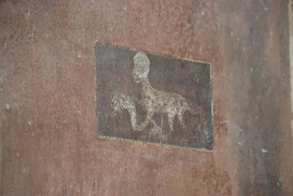 III.11 Herculaneum. October 2020. Room 5, detail of panel on east wall. Photo courtesy of Klaus Heese.