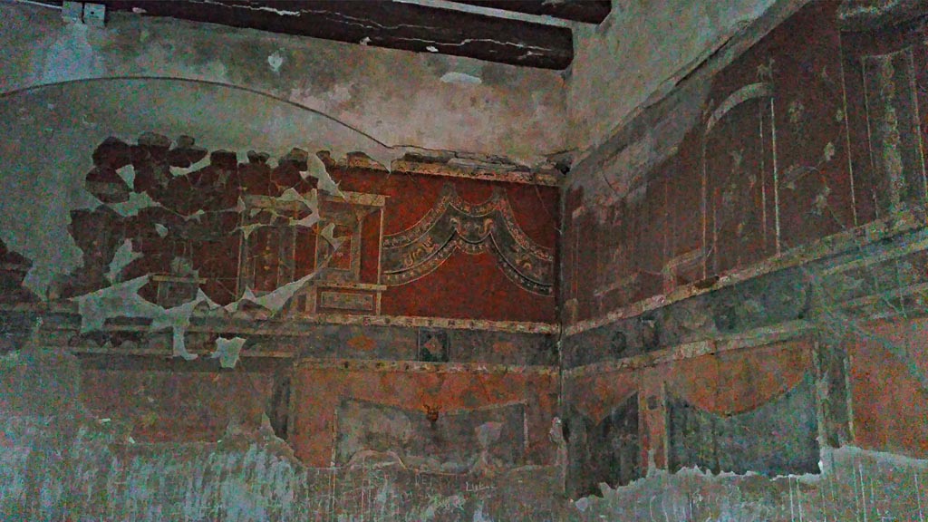 III.11 Herculaneum. Photo taken between October 2014 and November 2019. 
Room 8, upper east wall in south-east corner. Photo courtesy of Giuseppe Ciaramella.
