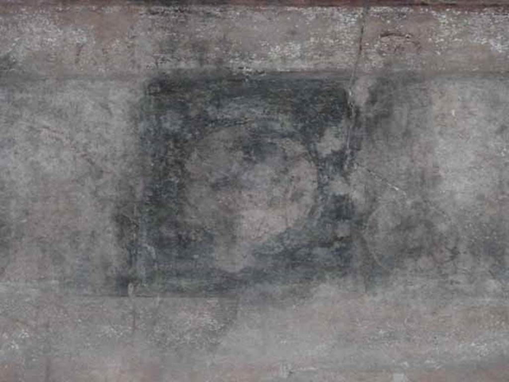 III.11 Herculaneum. May 2010. Room 8, detail from south wall.