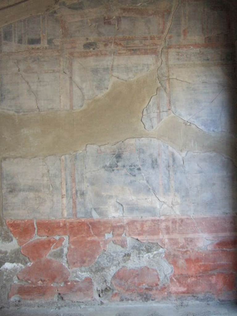 III.11 Herculaneum. May 2006. Room 9, south wall..