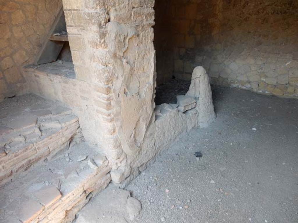 III.10, Herculaneum, May 2018. Base of steps at south end of shop. Photo courtesy of Buzz Ferebee