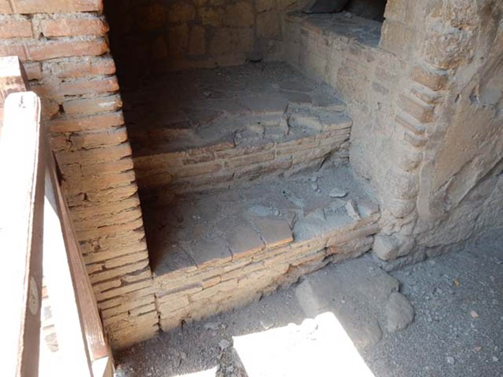 III.10, Herculaneum, May 2018. Detail of base of steps to upper floor. Photo courtesy of Buzz Ferebee