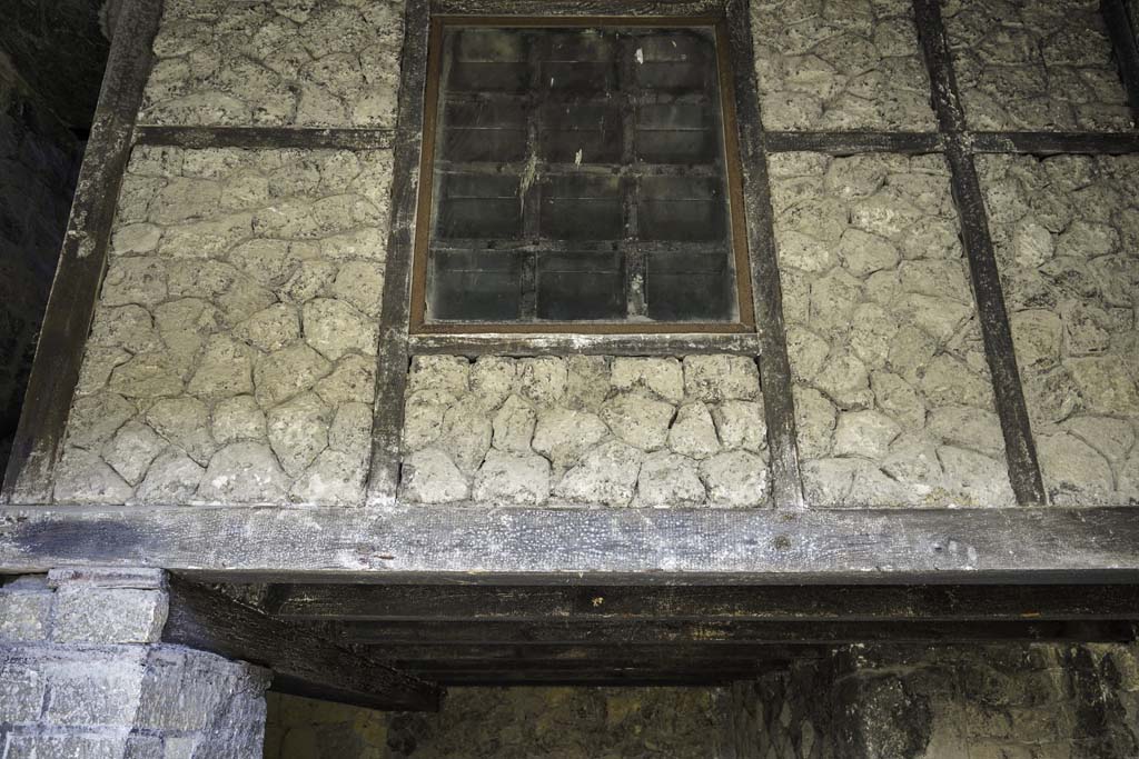III.12 Herculaneum, August 2021. Room with window, set on rafters on upper floor. Photo courtesy of Robert Hanson