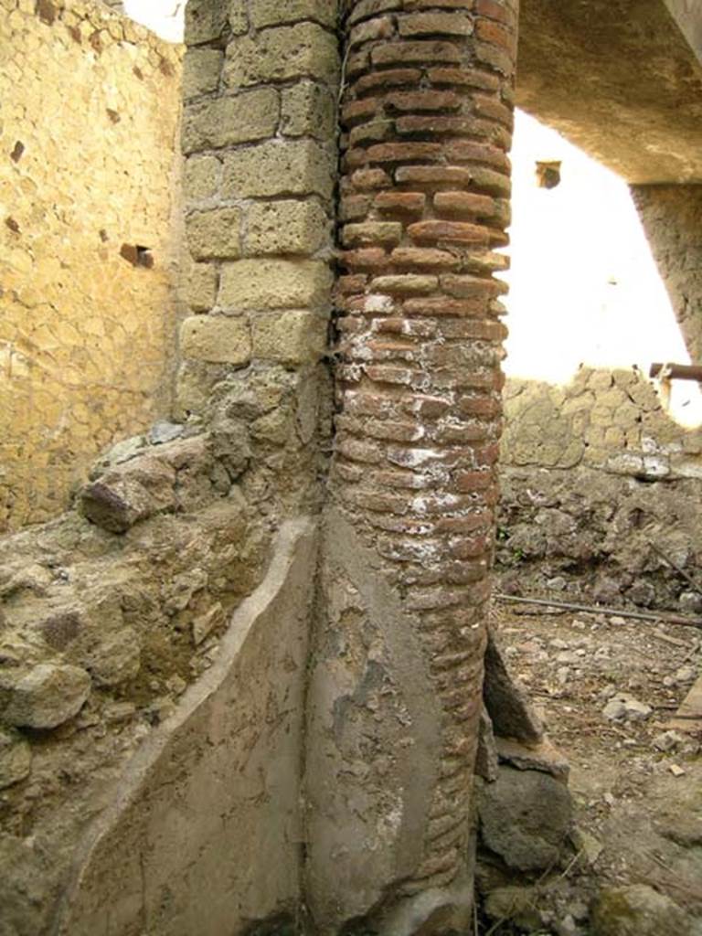 III.14/15, Herculaneum, April 2005. Looking towards north end of west wall, and column in north-west corner of room 12, joined to pilaster in room 13. 
Photo courtesy of Nicolas Monteix.
