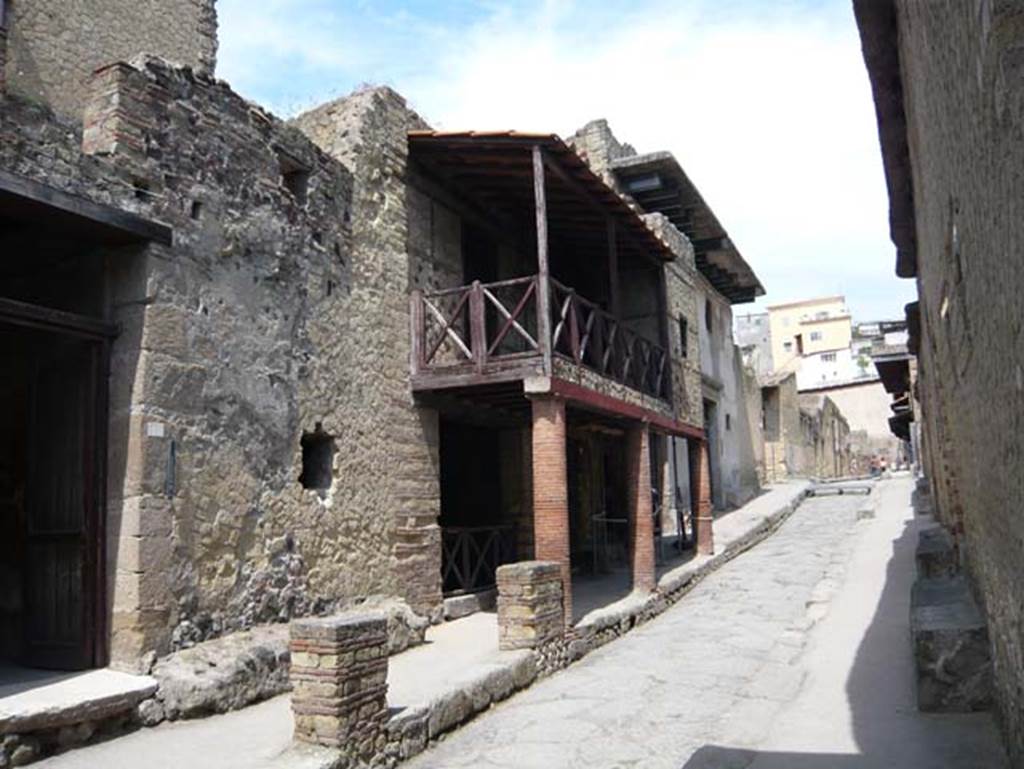 Ins. III 16, on left, Herculaneum May 2009. Looking north from entrance doorway along Cardo IV Inferiore.  Photo courtesy of Buzz Ferebee.
