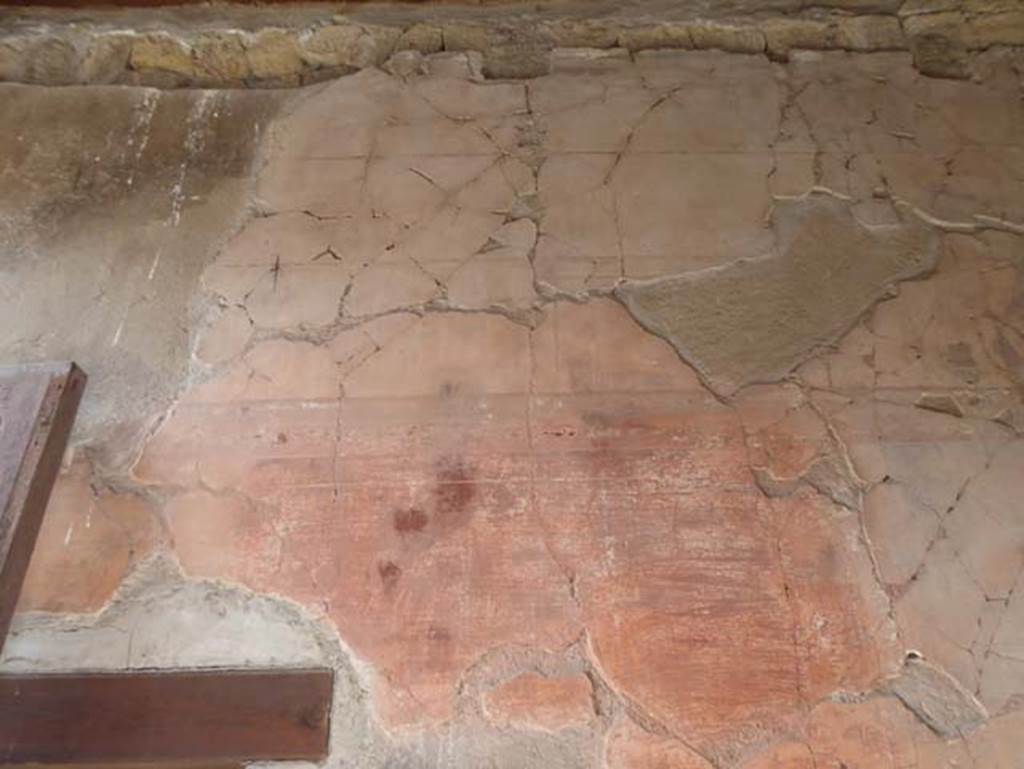 III 16, Herculaneum, October 2014. Room 1, south wall with remains of painted stucco, and doorway to room 2.  Photo courtesy of Michael Binns.
