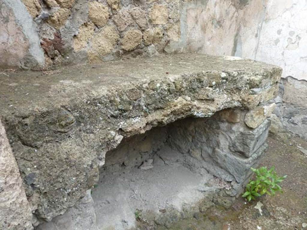 Ins. III.18 Herculaneum, September 2015. Bench/hearth???? in small room 38a, kitchen????.