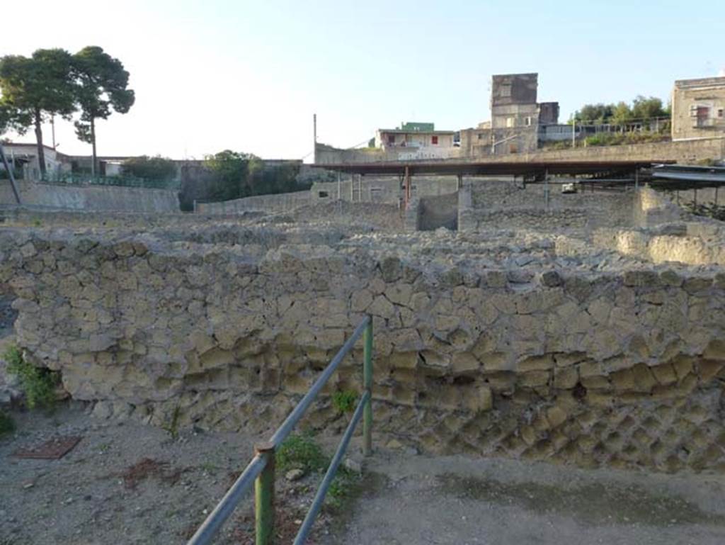 III, 19/18/1, Herculaneum. October 2012. Looking west from Cardo IV Inferiore, across rooms on south side of atrium. Photo courtesy of Michael Binns.

