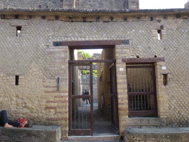 IV.4 Herculaneum. October 2012. Entrance doorway in centre. Photo courtesy of Michael Binns.