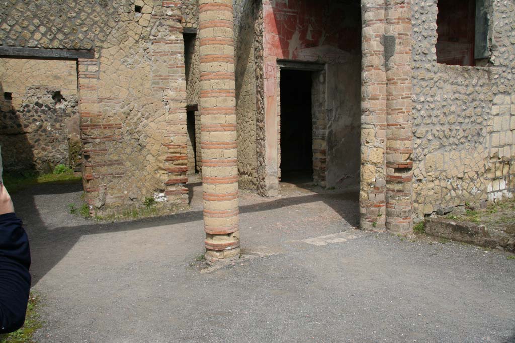 IV.4, Herculaneum, October 2020.  
Looking towards doorway to room 4 in west wall of small courtyard 3. Photo courtesy of Klaus Heese.

