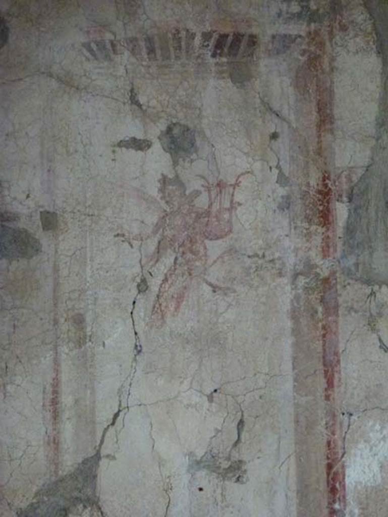 IV.11, Herculaneum, October 2012. Detail from painting on east wall. Photo courtesy of Michael Binns.