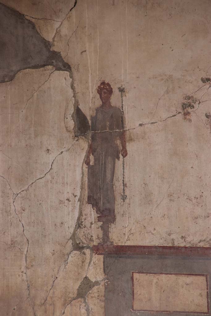 IV.15/16, Herculaneum, October 2020.  
Detail of painted figure of upper south end of west wall of room 9. Photo courtesy of Klaus Heese.
