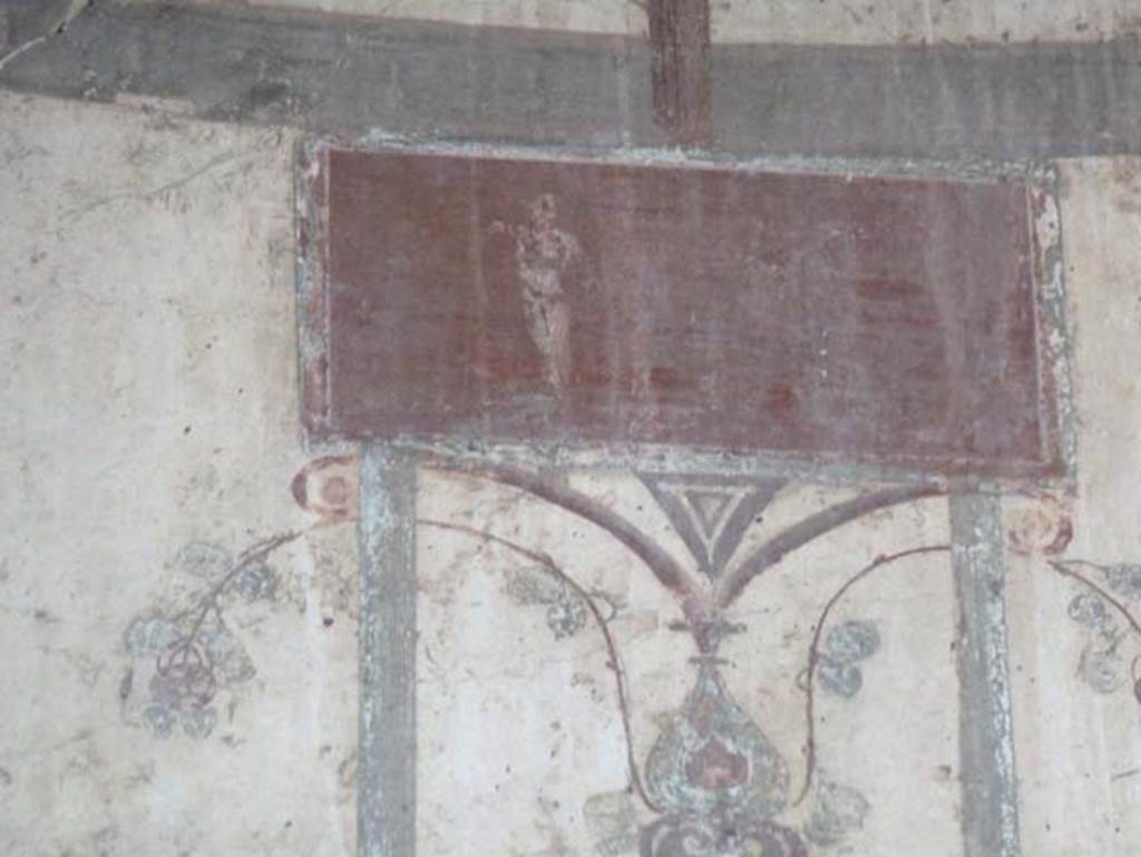 Ins. IV.15/16, Herculaneum, September 2015. Detail from painted decorative panel at north end of upper west wall. 