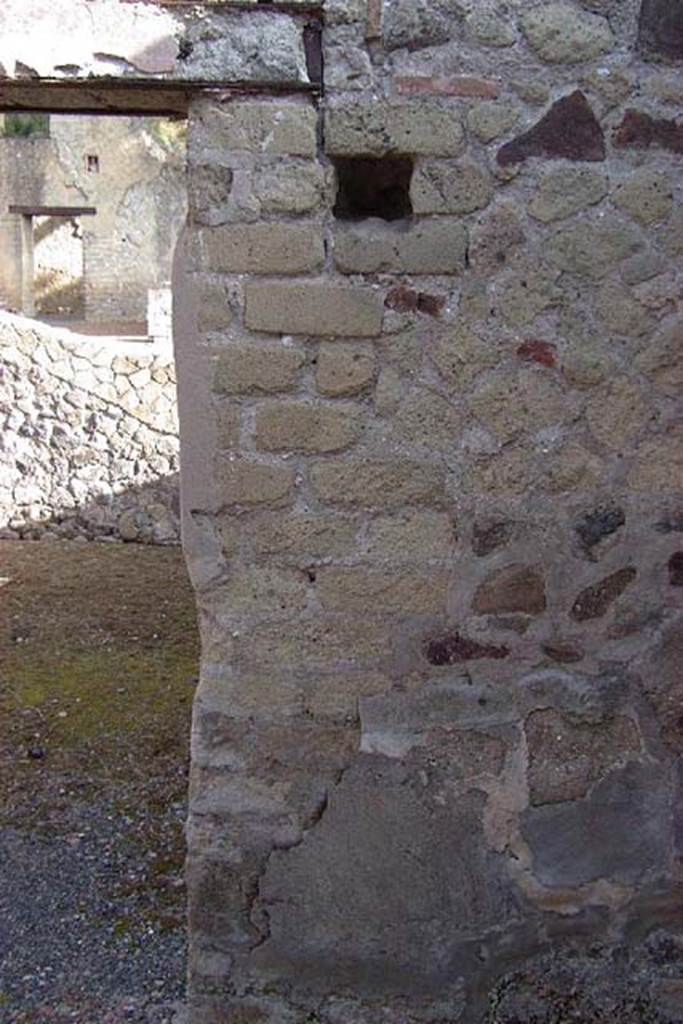 IV.18, Herculaneum, July 2001. Room 9, south side of doorway in east wall leading into triclinium 10. 
Photo courtesy of Nicolas Monteix.


