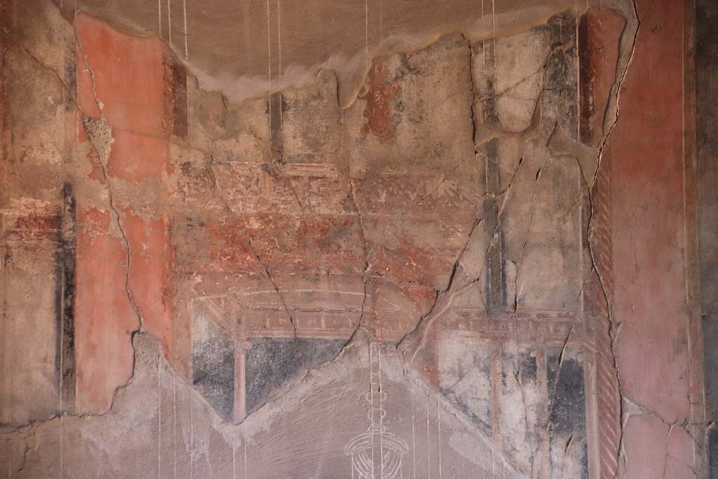 IV.21, Herculaneum. October 2020. Triclinium 5, detail from west wall at south end. Photo courtesy of Klaus Heese.