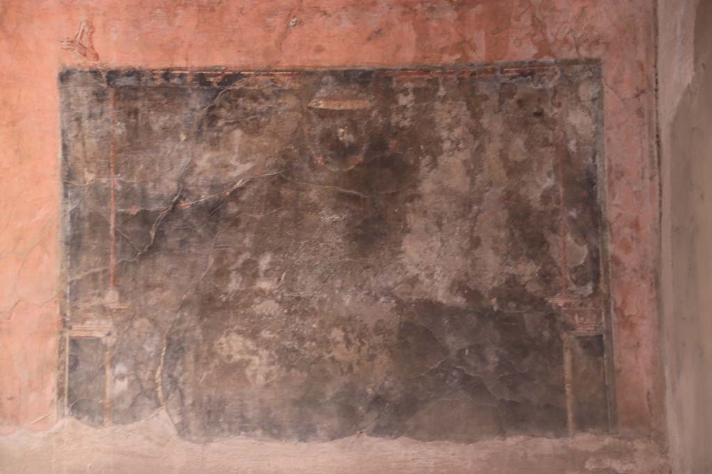 IV.21, Herculaneum. October 2020. Triclinium 5, panel on east wall at south end above doorway to atrium. Photo courtesy of Klaus Heese.