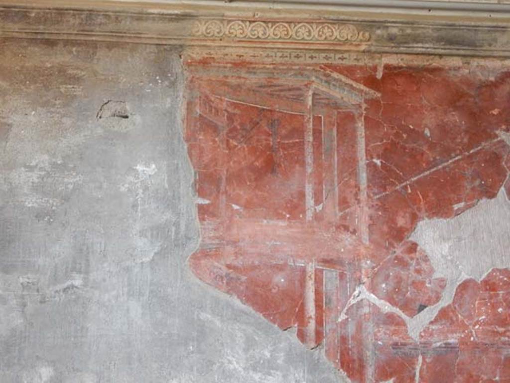 IV.21, Herculaneum. May 2018. Oecus 7, detail of painted decoration from upper west wall.
Photo courtesy of Buzz Ferebee. 
