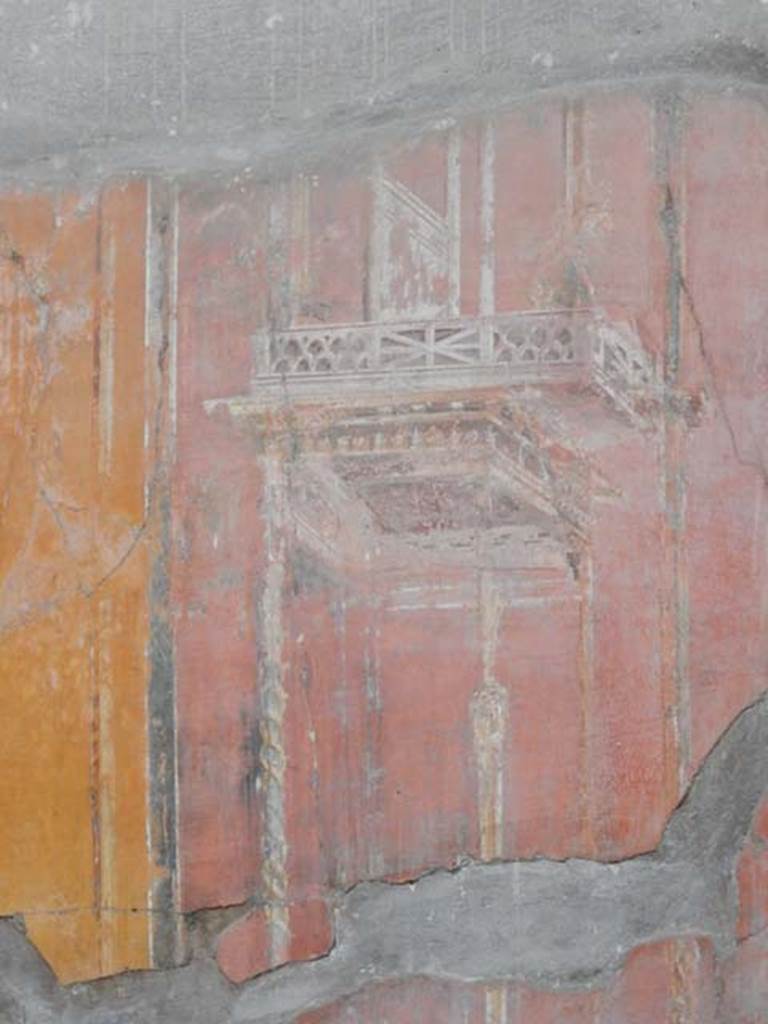 IV.21, Herculaneum. May 2018. Oecus 7, detail of painted decoration from north wall.
Photo courtesy of Buzz Ferebee. 
