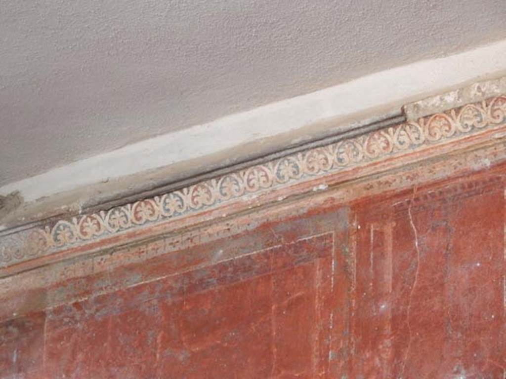 IV.21, Herculaneum. May 2018. Room 7, detail from upper north wall. Photo courtesy of Buzz Ferebee. 