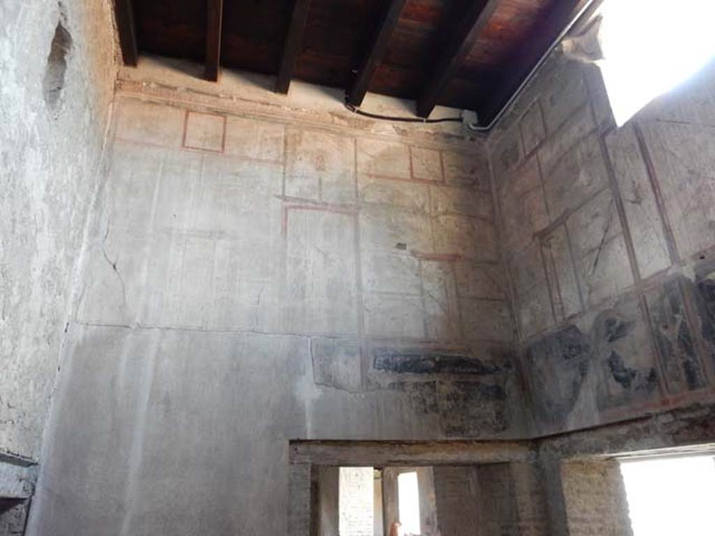 IV.21, Herculaneum. May 2018. Room 6, looking towards upper east wall.
The doorway to Corridor 27, is on left, doorway to Triclinium 5, centre right, and doorway to Cryptoporticus 28, on right.
Photo courtesy of Buzz Ferebee. 

