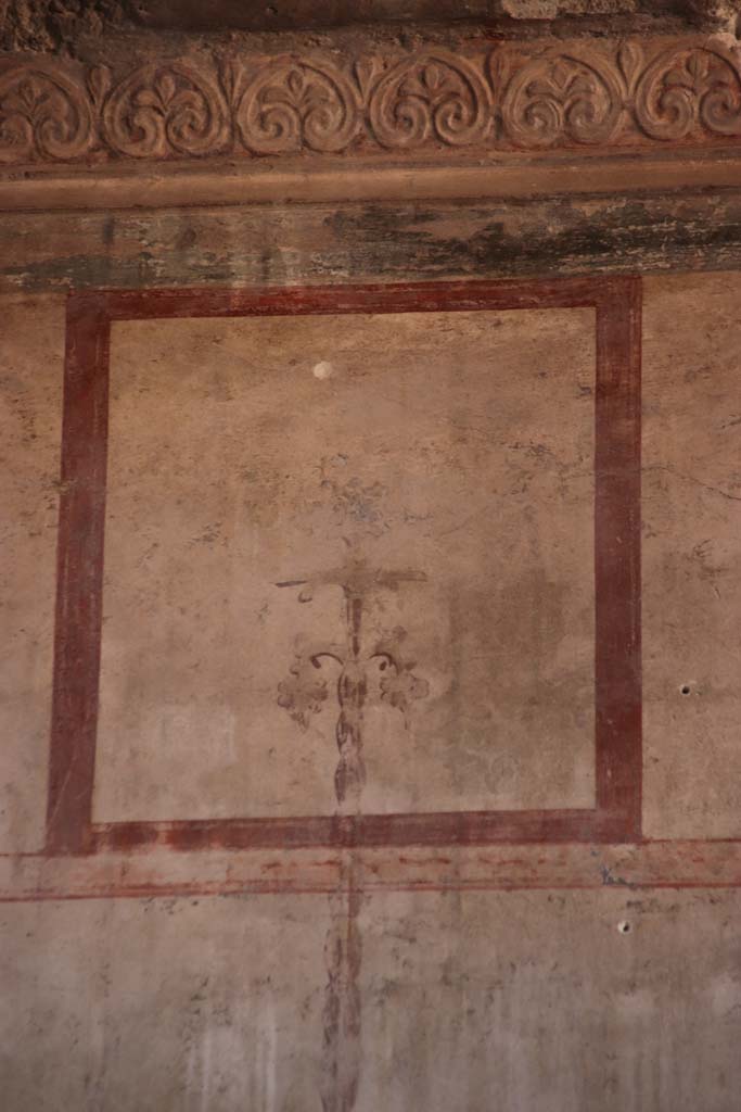 IV.21, Herculaneum. October 2020. Room 6, detail from painted panel at north end of upper east wall. Photo courtesy of Klaus Heese.