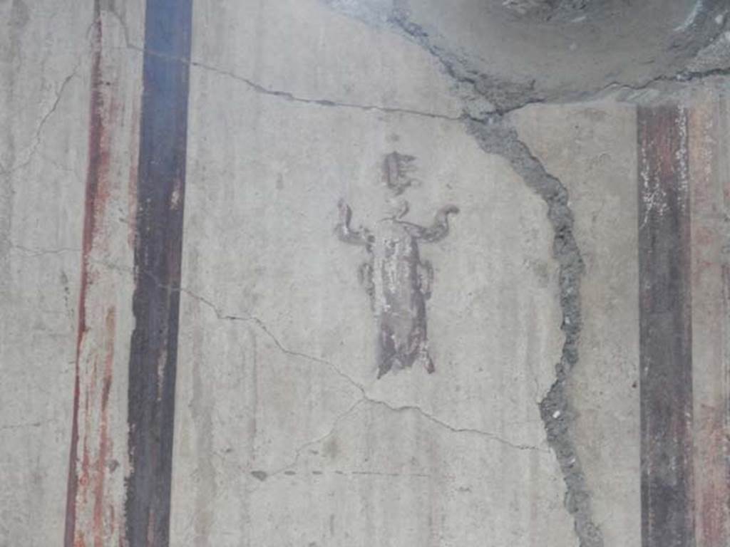 IV.21, Herculaneum. May 2018. Room 6, detail of painted figure from upper south wall.
Photo courtesy of Buzz Ferebee. 
