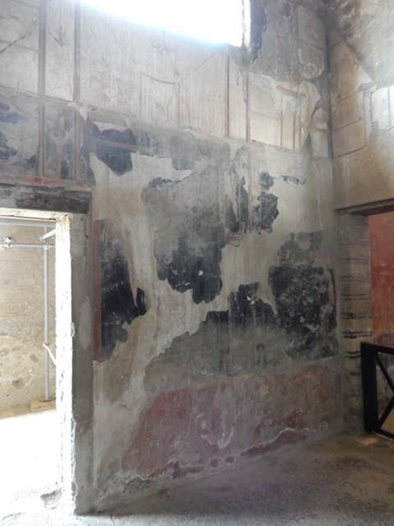 IV.21, Herculaneum. May 2018. 
Room 6, looking towards south wall and south-west corner, with doorway to Oecus 7.
Photo courtesy of Buzz Ferebee. 
