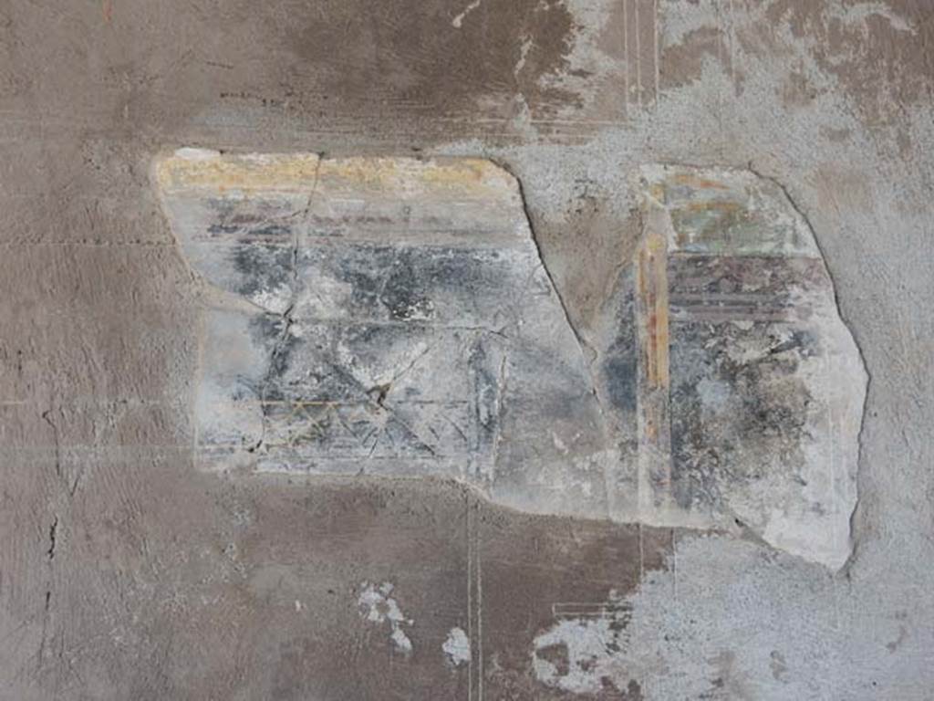 IV.21, Herculaneum. May 2018. Cryptoporticus 28, remaining decoration from north wall. 
Photo courtesy of Buzz Ferebee. 