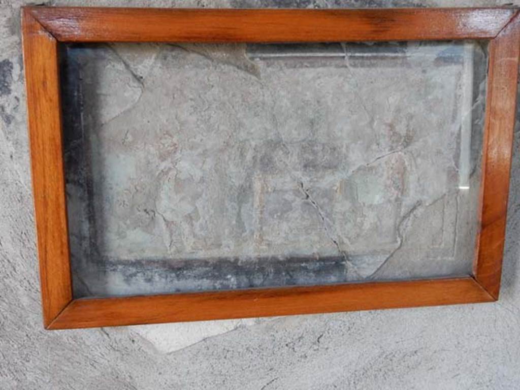 IV.21, Herculaneum. May 2018. Cryptoporticus 28, cupid painting on north wall. Photo courtesy of Buzz Ferebee. 