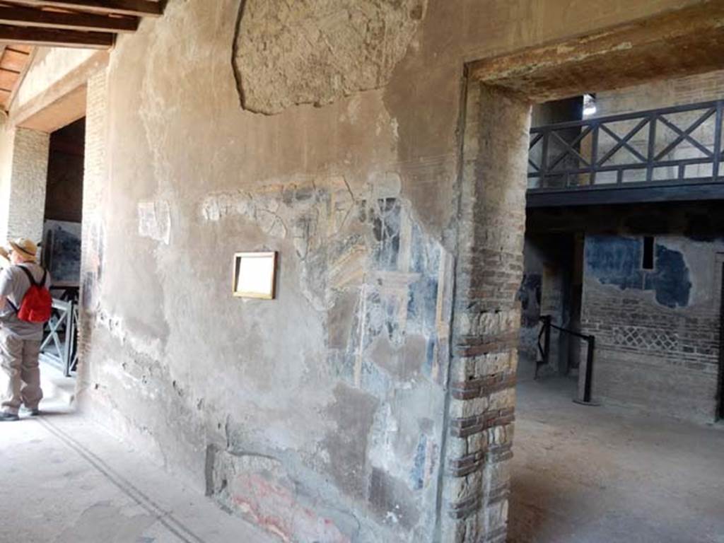 IV.21, Herculaneum. May 2018. Cryptoporticus 28, looking west along the north wall, with the atrium doorway, on right.
Photo courtesy of Buzz Ferebee. 
