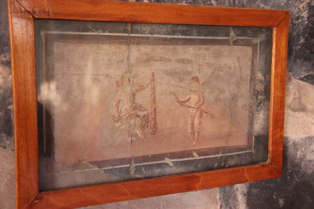 IV.21, Herculaneum. October 2020. Cryptoporticus 28, cupid painting from east end of north wall. Photo courtesy of Klaus Heese.