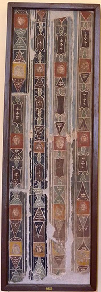 IV.21 Herculaneum, either Cryptoporticus 31 (west side) or 29 (east side).  Found 6th August 1748.  Two panels divided into 4 vertical faces showing painted figures and masks.   Now in Naples Archaeological Museum. Inventory number 9689.
