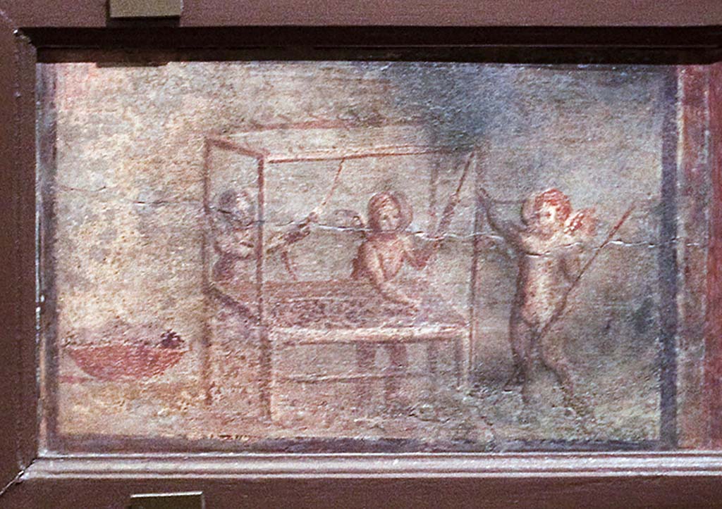 IV.21, Herculaneum. Small painting of Cupids weaving, found 13th August 1748 in the Scavi at Resina.
Now in Naples Archaeological Museum. Part of inventory number 9177.
