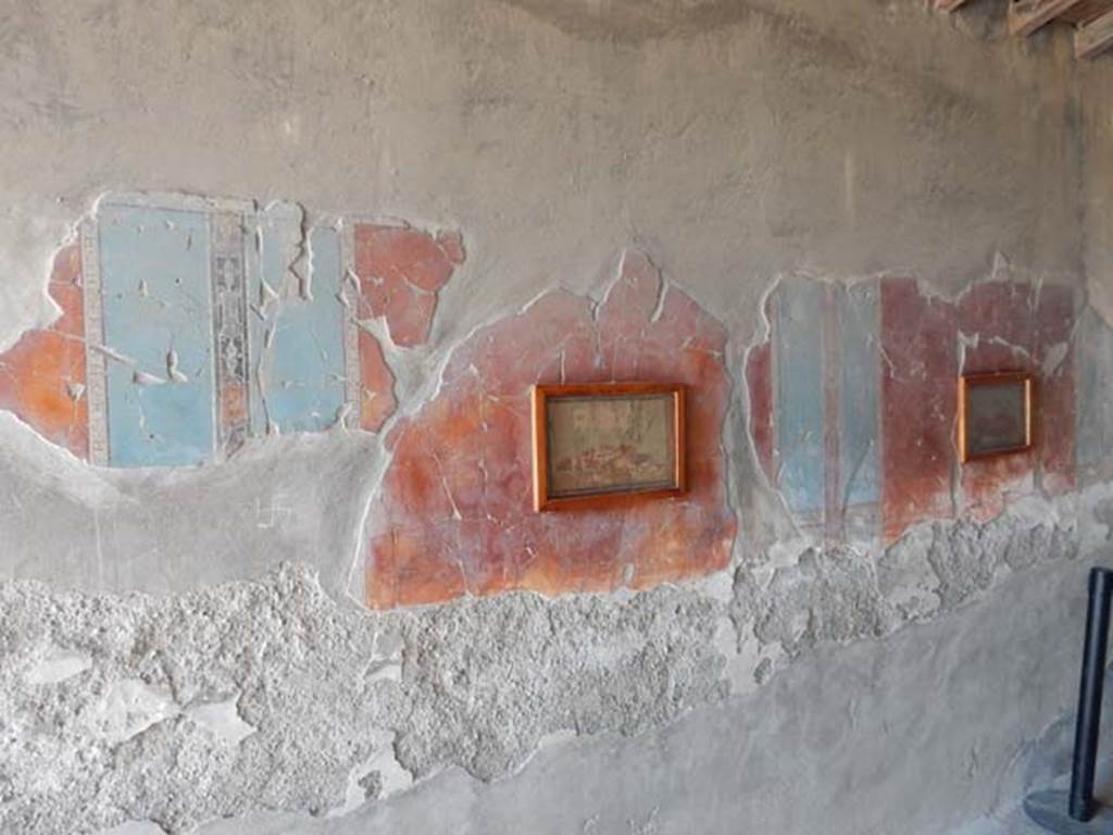 IV.21, Herculaneum. May 2018. Cryptoporticus 29, looking towards west wall with painted decoration and panels. 
Photo courtesy of Buzz Ferebee. 
