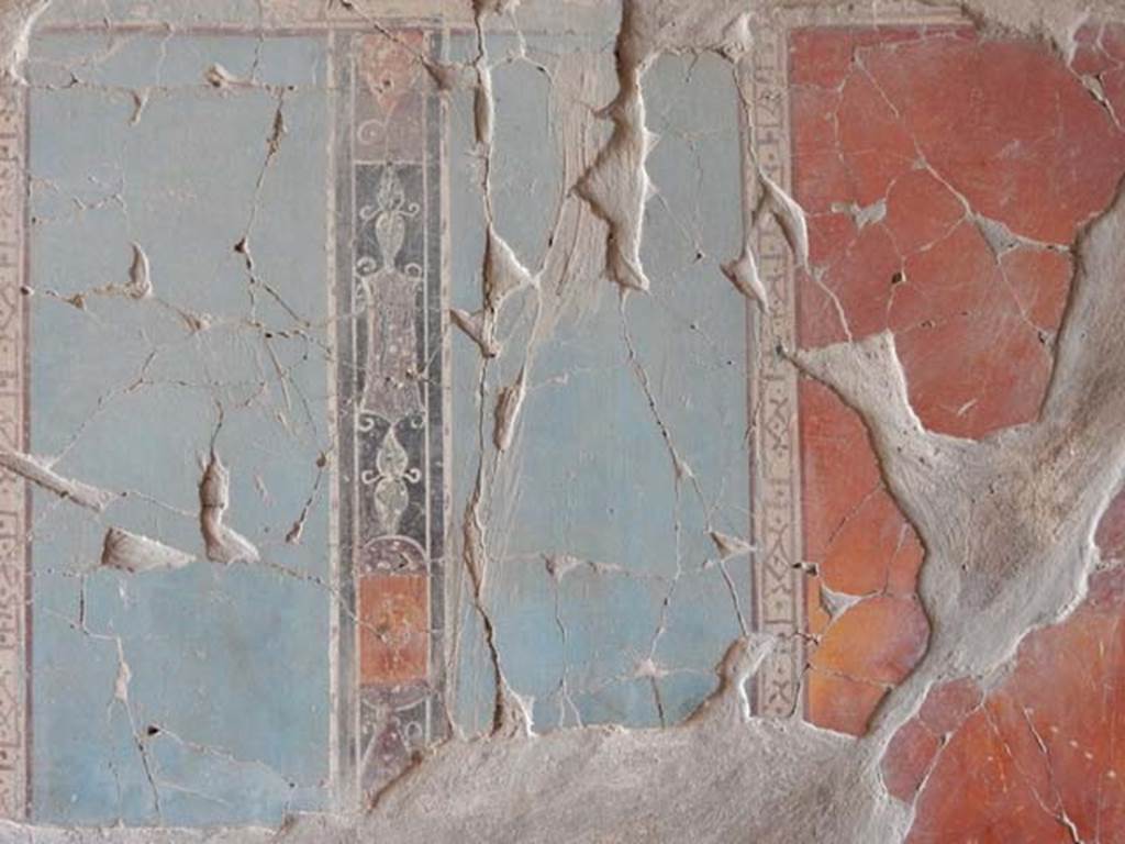 IV.21, Herculaneum. May 2018. Cryptoporticus 29, detail of painted decoration on west wall. 
Photo courtesy of Buzz Ferebee. 
