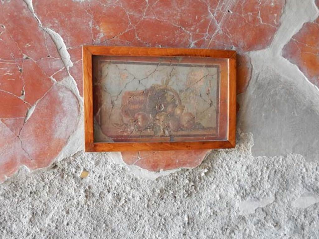 IV.21, Herculaneum. May 2018. 
Cryptoporticus 29, painted panel with still life of fallen basket of fruit, from west wall of east portico.
Photo courtesy of Buzz Ferebee. 
