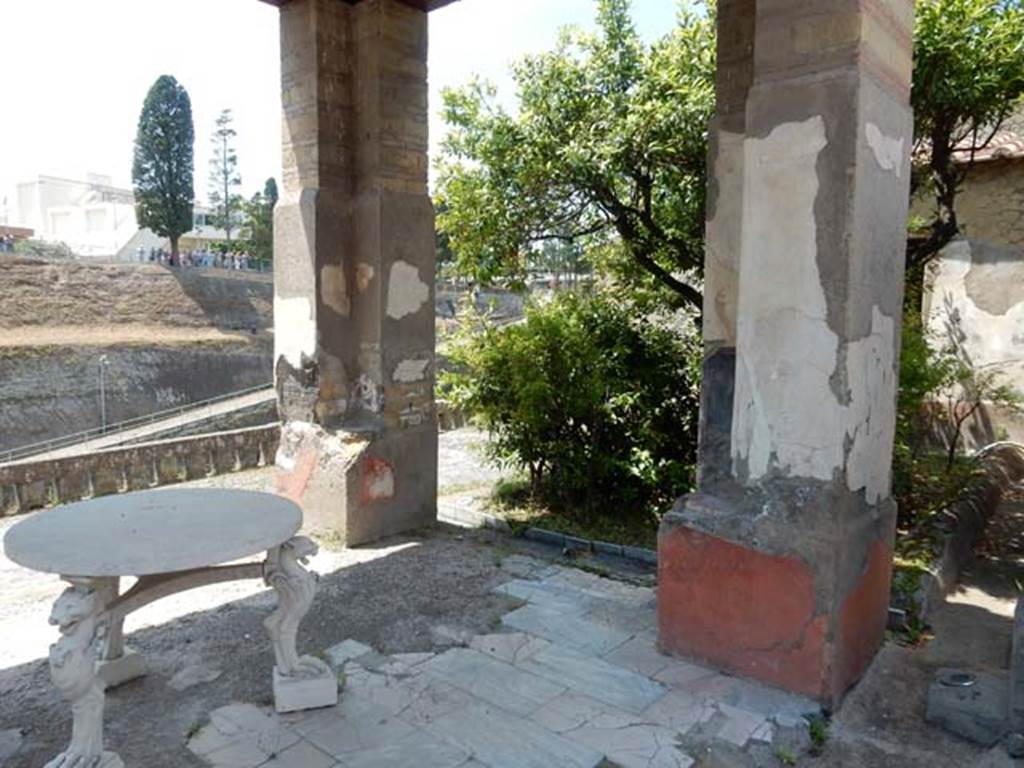 IV.21, Herculaneum. May 2018. Room 18, looking towards pilasters on west side, with garden terrace. 
Photo courtesy of Buzz Ferebee. 
