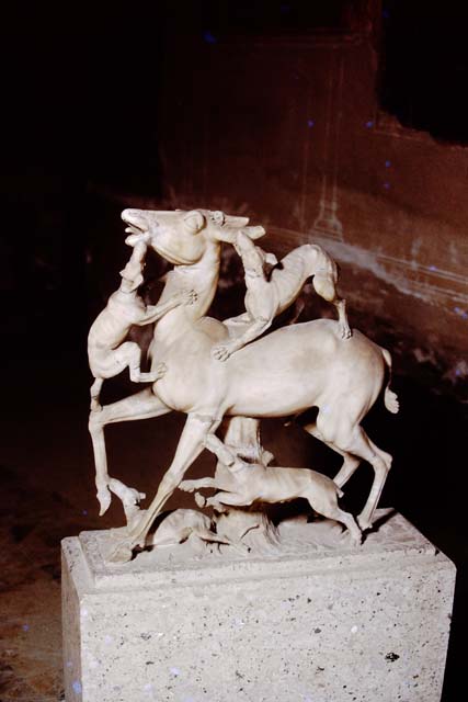 IV.21 Herculaneum, May 2009. Statue of deer being attacked by hounds, according to Maiuri these two groups of deer were found in a part of the garden which had not been traversed by the underground tunnels. Photo courtesy of Buzz Ferebee.
