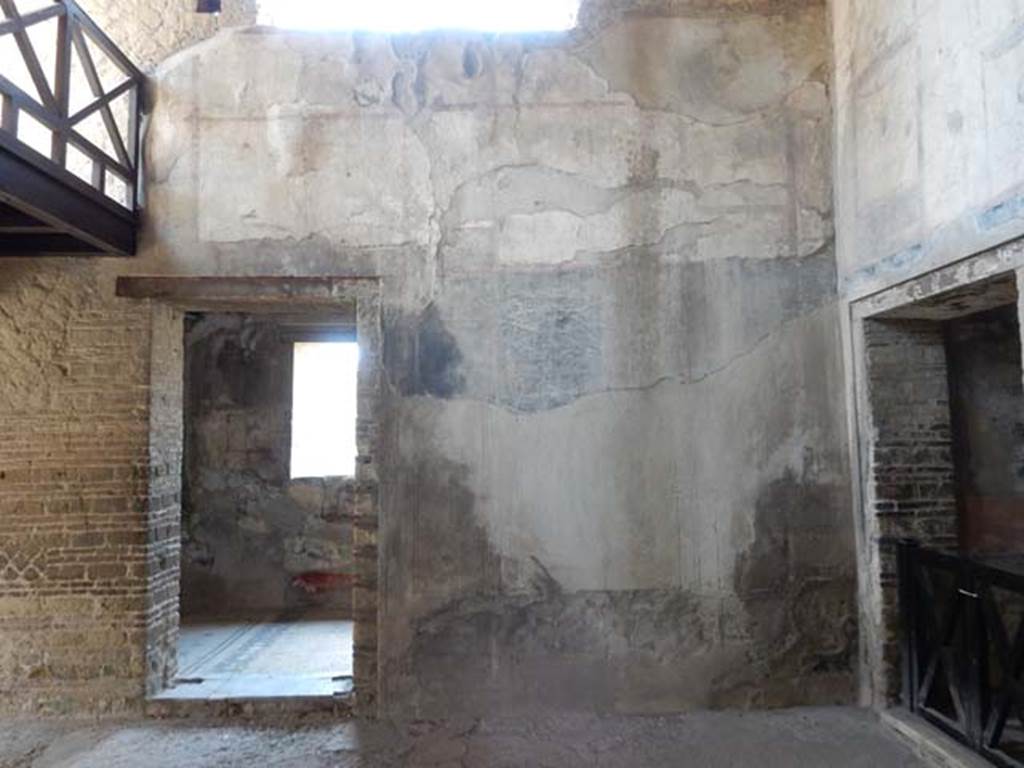 IV.21, Herculaneum. May 2018. Room 24, looking towards south wall and doorway to cryptoporticus 28, left. 
Photo courtesy of Buzz Ferebee. 
