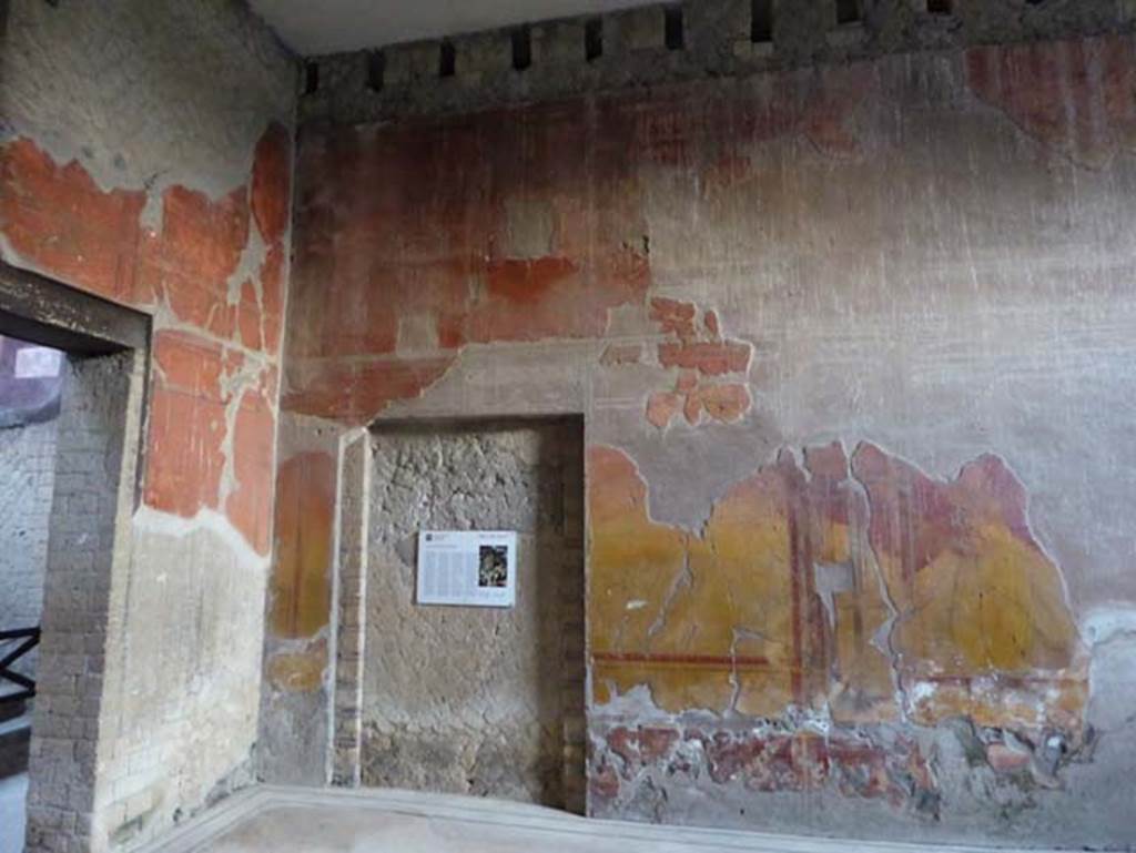 V.8, Herculaneum. October 2014. Room 7, looking towards east wall and north-east corner, with blocked doorway.  Photo courtesy of Michael Binns.
Guidobaldi and Esposito wrote - “The grand salon (7) was originally part of the adjacent House of the Bicentenary and probably used as a triclinium.”
See Guidobaldi, M.P. and Esposito, D. (2013). Herculaneum: Art of the Buried City. U.S.A, Abbeville Press, (p.171).
