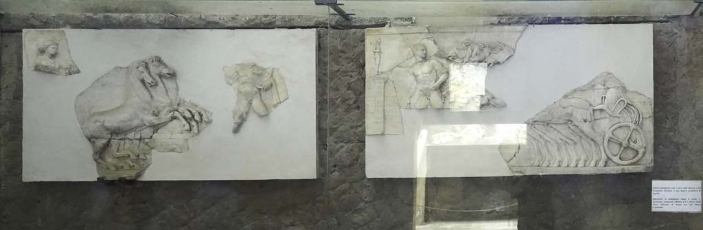V.8 Herculaneum. August 2021. Room 7, fragments displayed on south wall. Photo courtesy of Robert Hanson.

